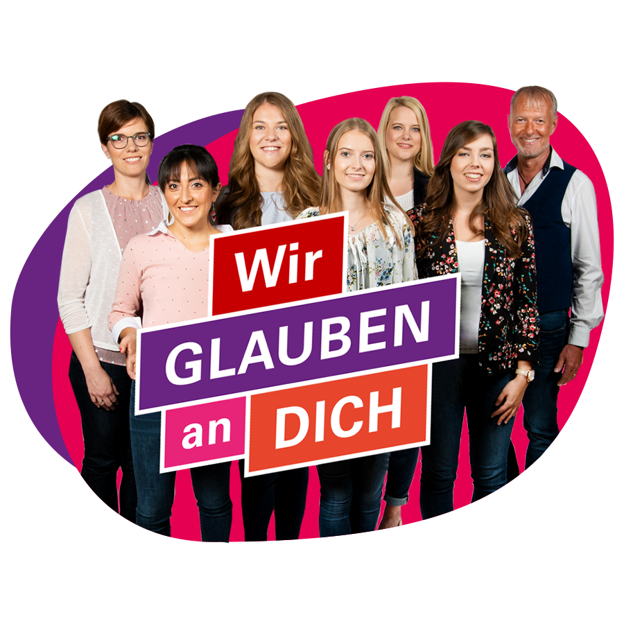 Ein Mann und 6 junge Frauen stehen in einer Gruppe zusammen und lächeln in die Kamera.